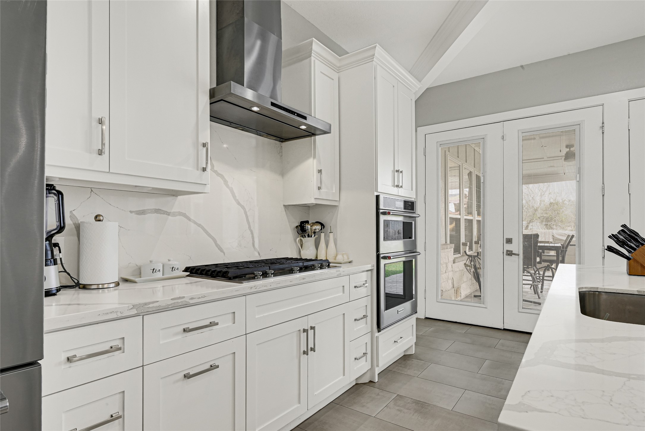 4821 1st Street Houston, TX 77504 - Photo 8 of 48 a kitchen with white cabinets and refrigerator