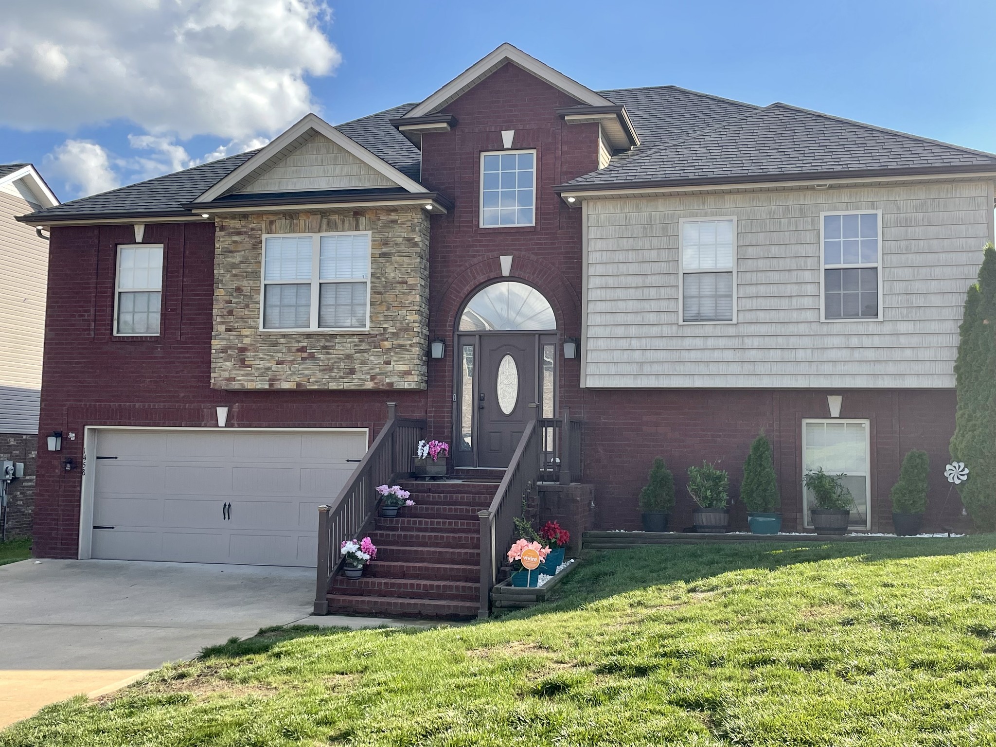 1458 Raven Road Clarksville, TN 37042 - Photo 1 of 33 a front view of a house with a yard