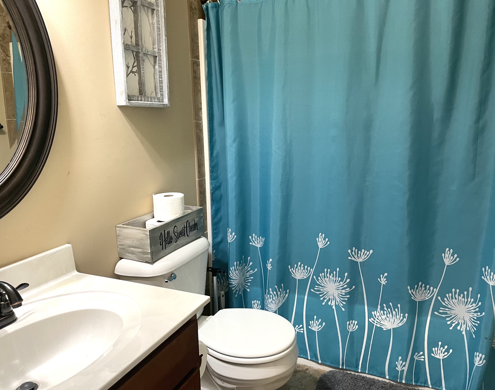 1458 Raven Road Clarksville, TN 37042 - Photo 21 of 33 a white toilet sitting next to a bathroom sink