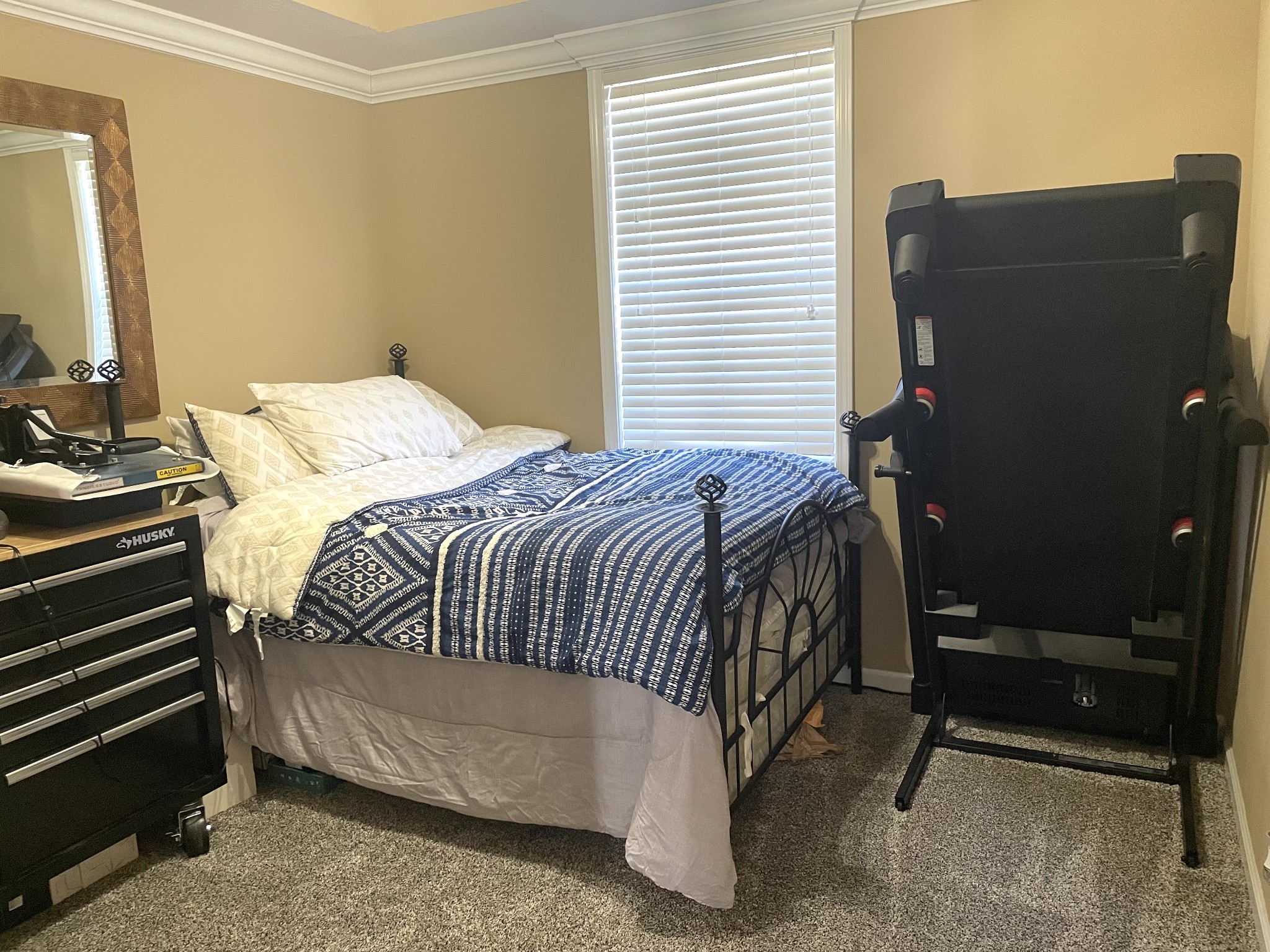 1458 Raven Road Clarksville, TN 37042 - Photo 26 of 33 a bedroom with a bed and a flat screen tv