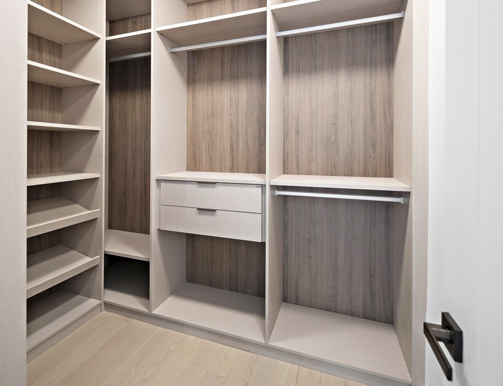 109 Wiswall Road Newton, MA 02459 - Photo 24 of 36 a view of an empty walk in closet