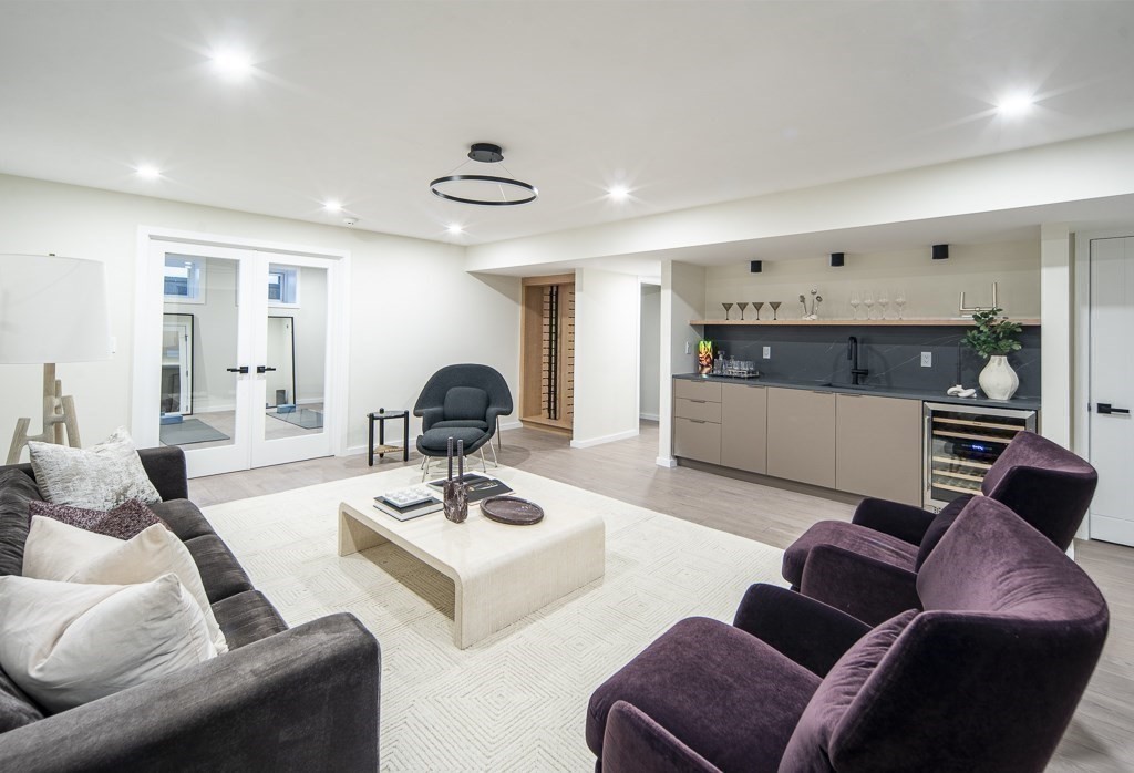109 Wiswall Road Newton, MA 02459 - Photo 30 of 36 a living room with furniture and a wooden floor