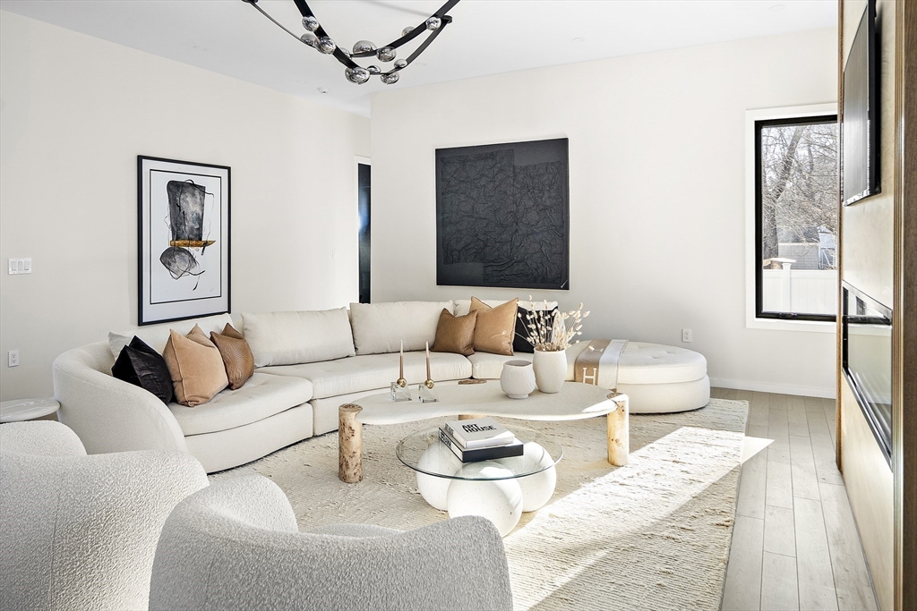 109 Wiswall Road Newton, MA 02459 - Photo 7 of 36 a living room with furniture and a painting