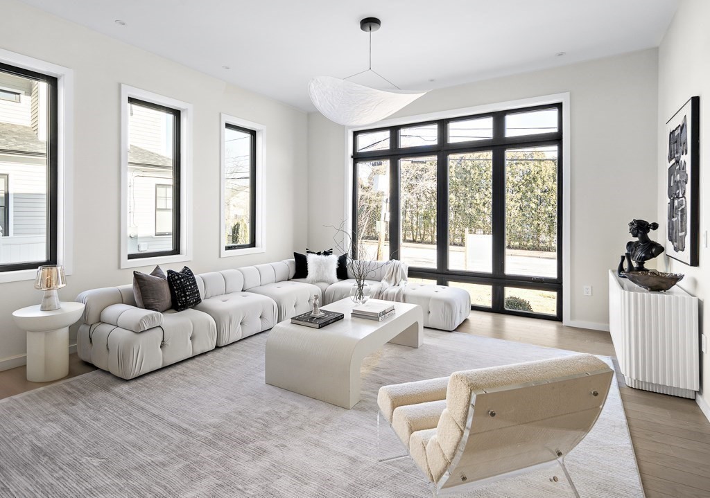 109 Wiswall Road Newton, MA 02459 - Photo 9 of 36 a living room with furniture and a large window