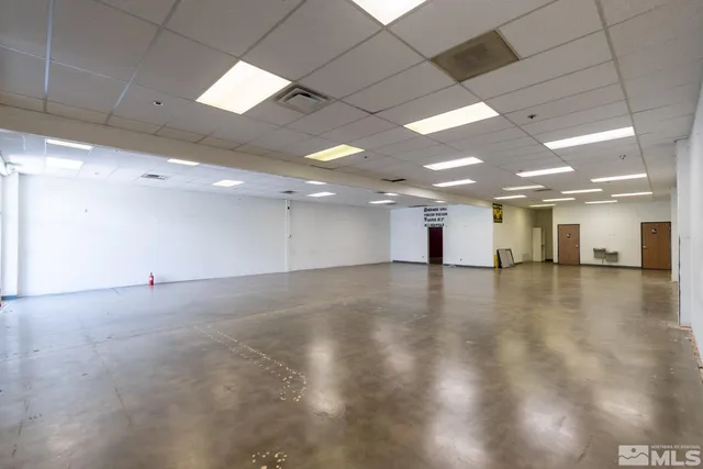 a view of a hallway with a room