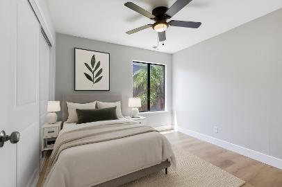 34 West 7th Street, Unit G Tracy, CA 95376 - Photo 4 of 7 a bedroom with a large bed and a window