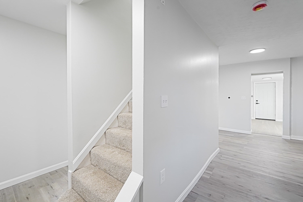 757 Main Street, Unit A Southbridge, MA 01550 - Photo 15 of 32 a view of an entryway with wooden floor