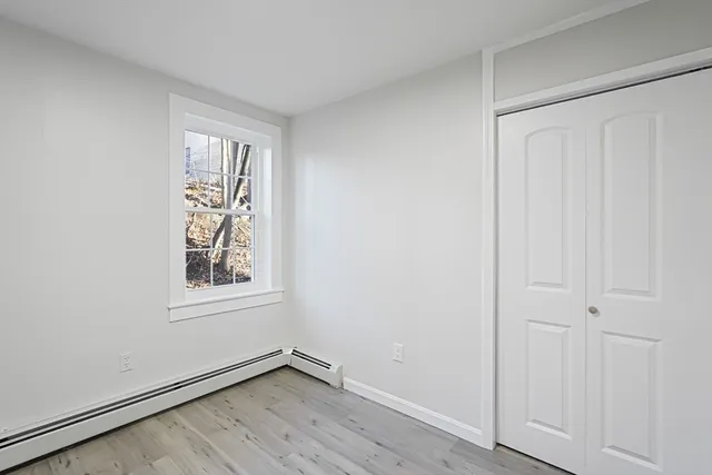a view of staircase with white walls
