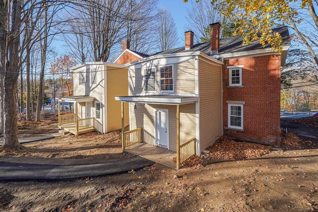 757 Main Street, Unit A Southbridge, MA 01550 - Photo 2 of 32 a view of a house with a yard