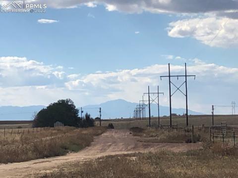 0 Berndt Road Yoder, CO 80864 - Photo 6 of 6 a view of a dry yard with wooden fence