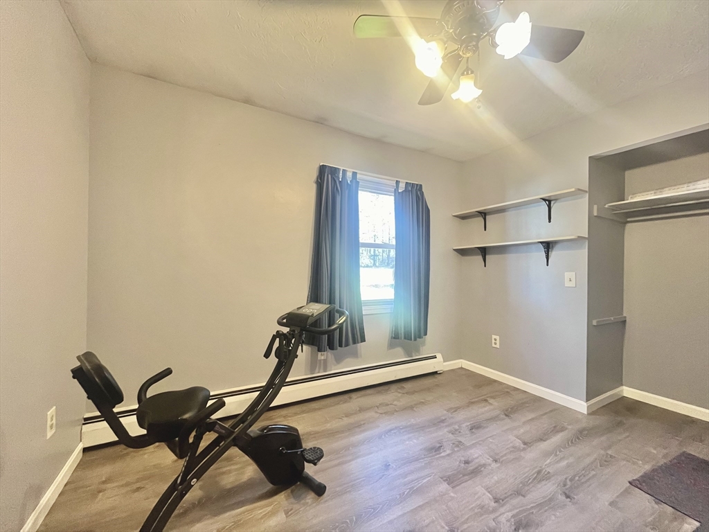 31 Putnam Road Sturbridge, MA 01566 - Photo 15 of 34 a view of a room with gym equipment and windows