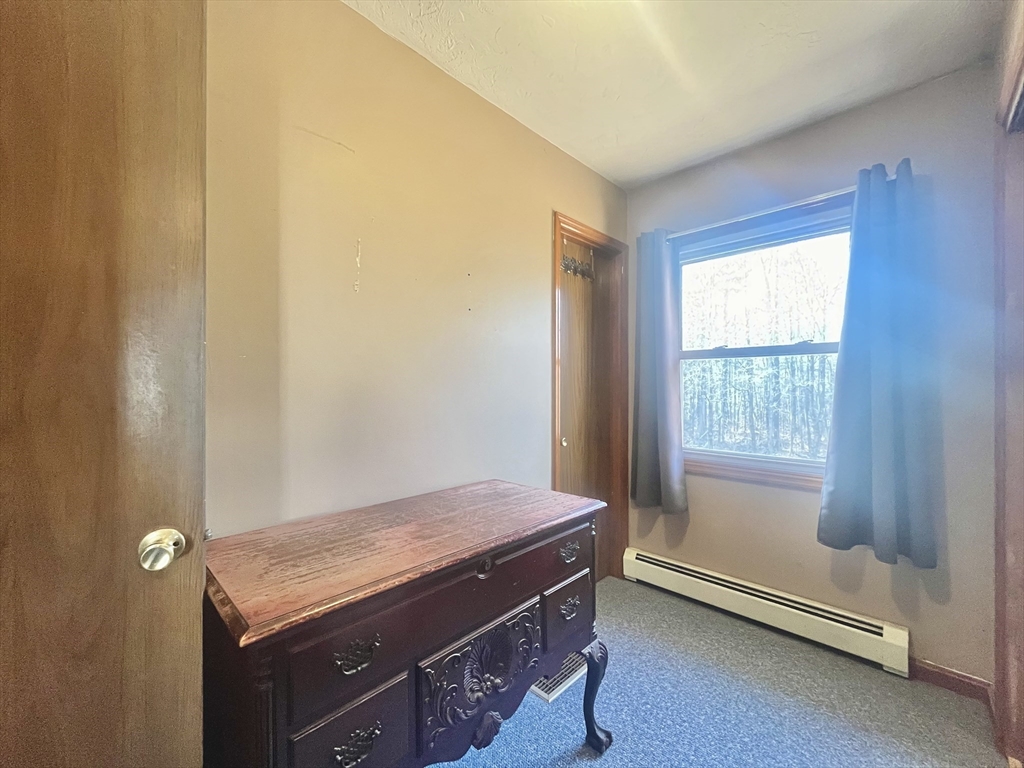 31 Putnam Road Sturbridge, MA 01566 - Photo 21 of 34 a view of an empty room and window