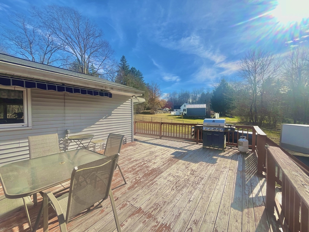 31 Putnam Road Sturbridge, MA 01566 - Photo 24 of 34 a view of a chairs and table on the terrace