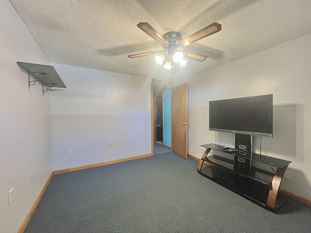 31 Putnam Road Sturbridge, MA 01566 - Photo 34 of 34 a view of a livingroom with a flat screen tv