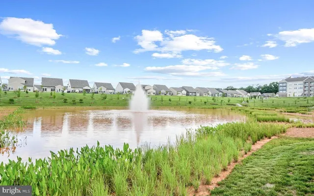 a view of a lake with a big yard