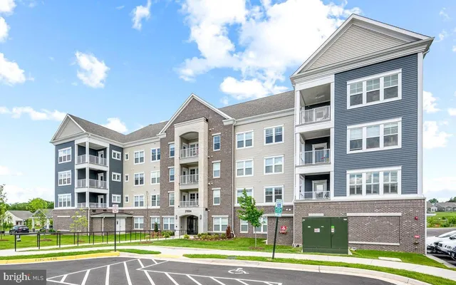 a view of a building with a porch