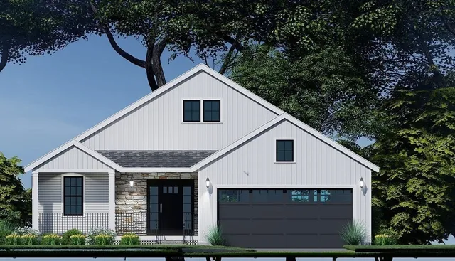 a view of a white house next to a yard