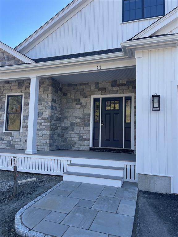 20 Coach Road South Easton, MA 01776 - Photo 4 of 11 a view of front door of house