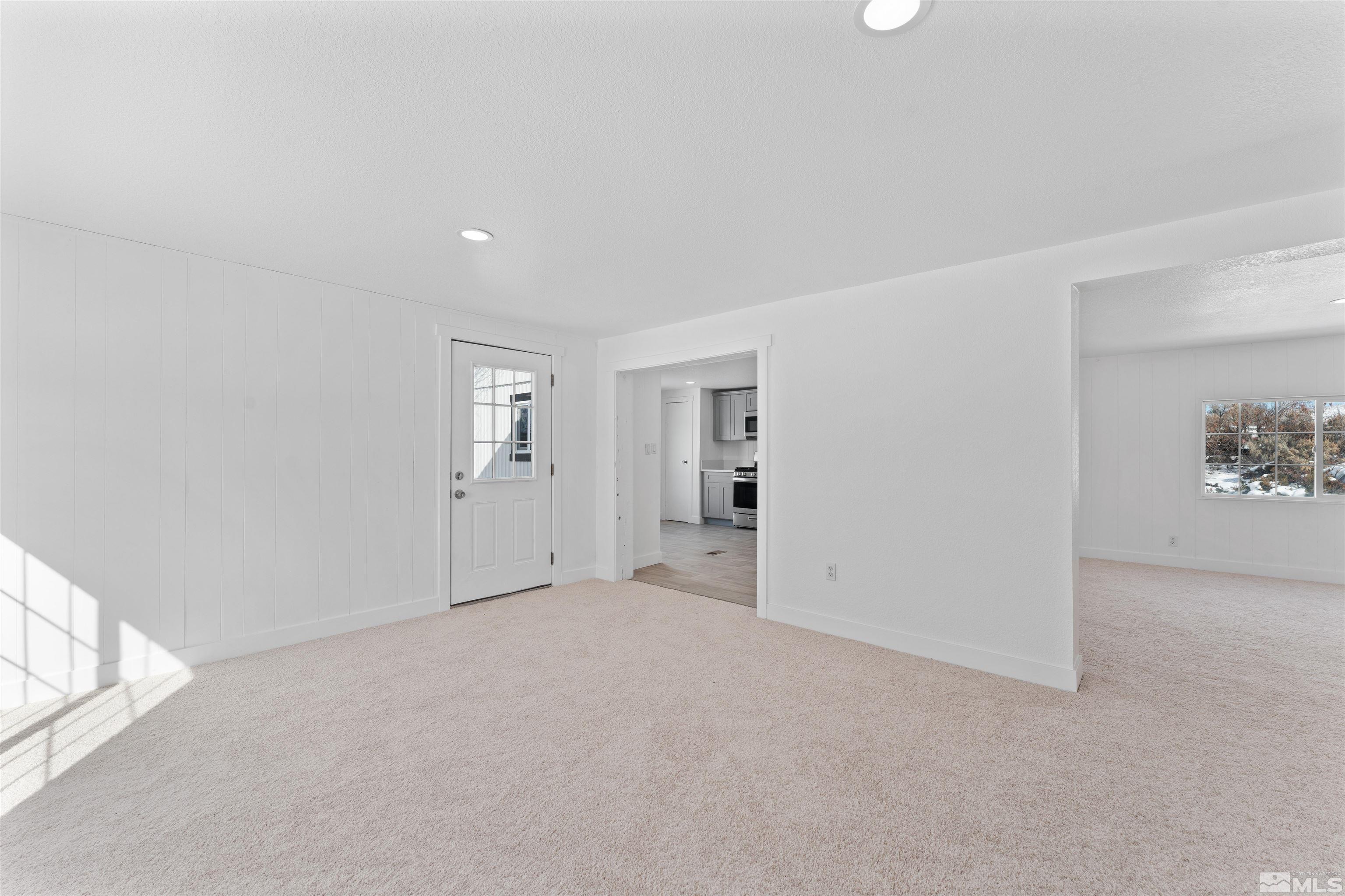 3993 Kiwi Court Reno, NV 89508 - Photo 12 of 39 an empty room with windows and closet