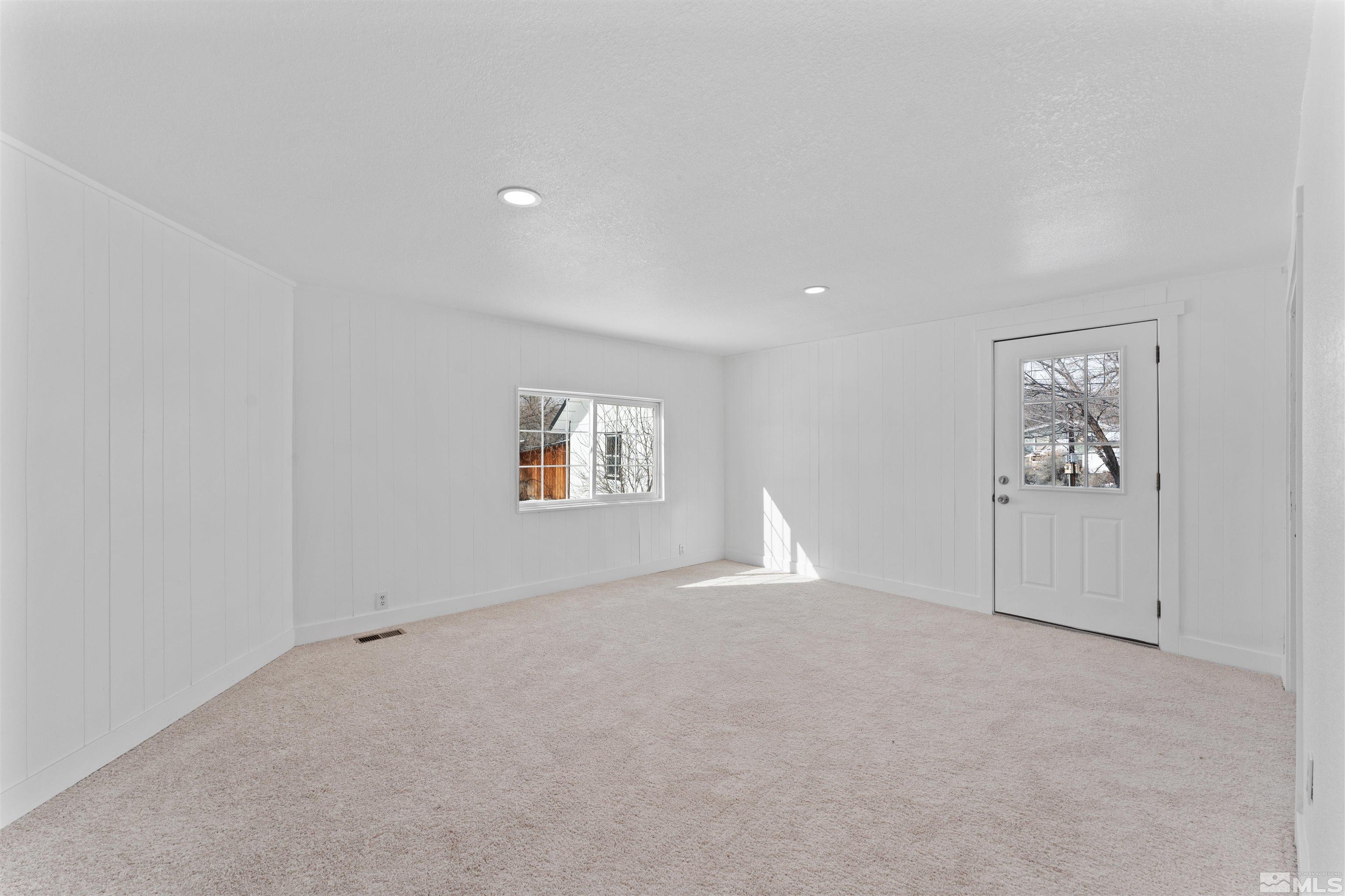 3993 Kiwi Court Reno, NV 89508 - Photo 13 of 39 an empty room with windows
