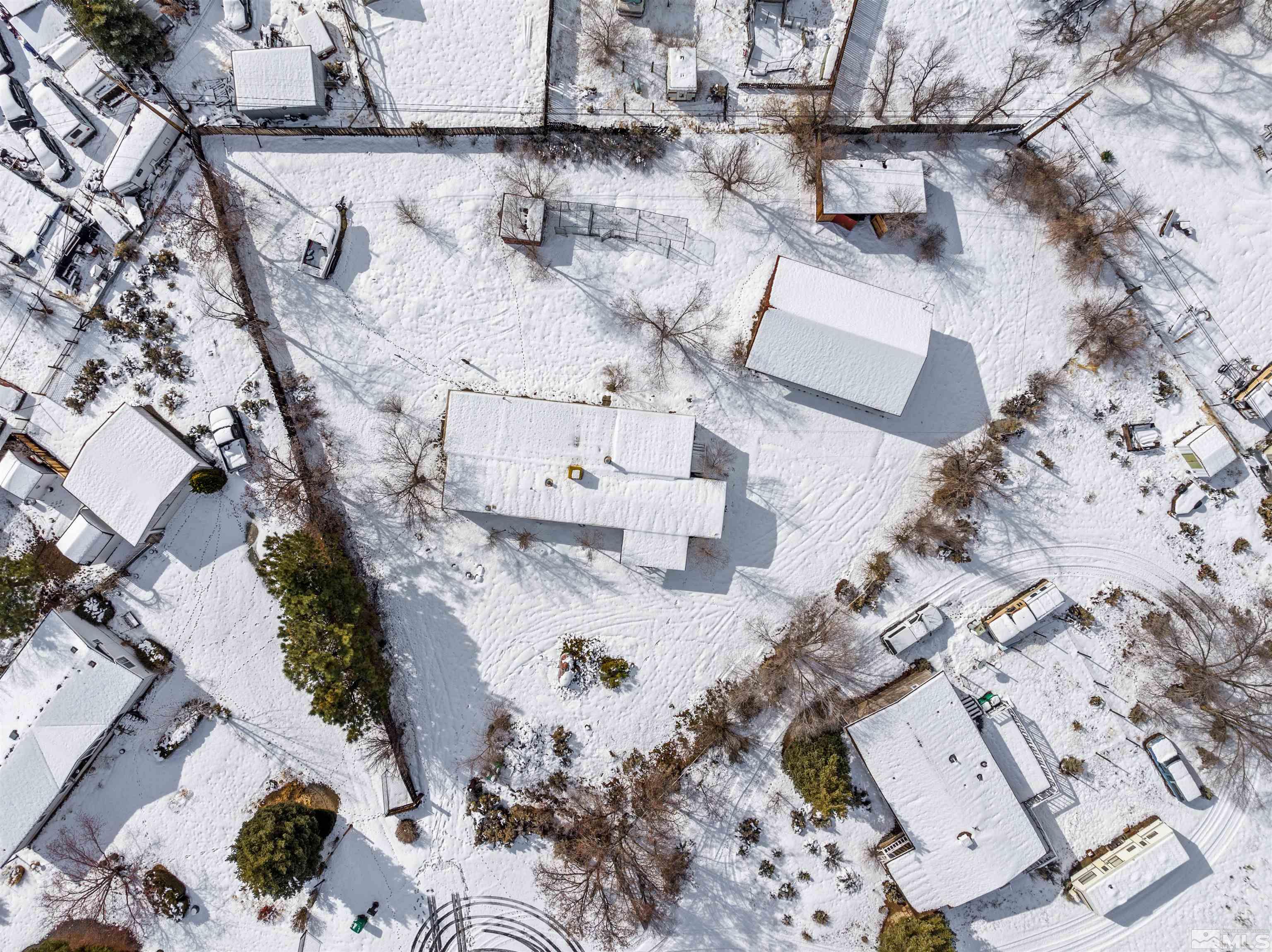 3993 Kiwi Court Reno, NV 89508 - Photo 2 of 39 an aerial view of residential houses with outdoor space
