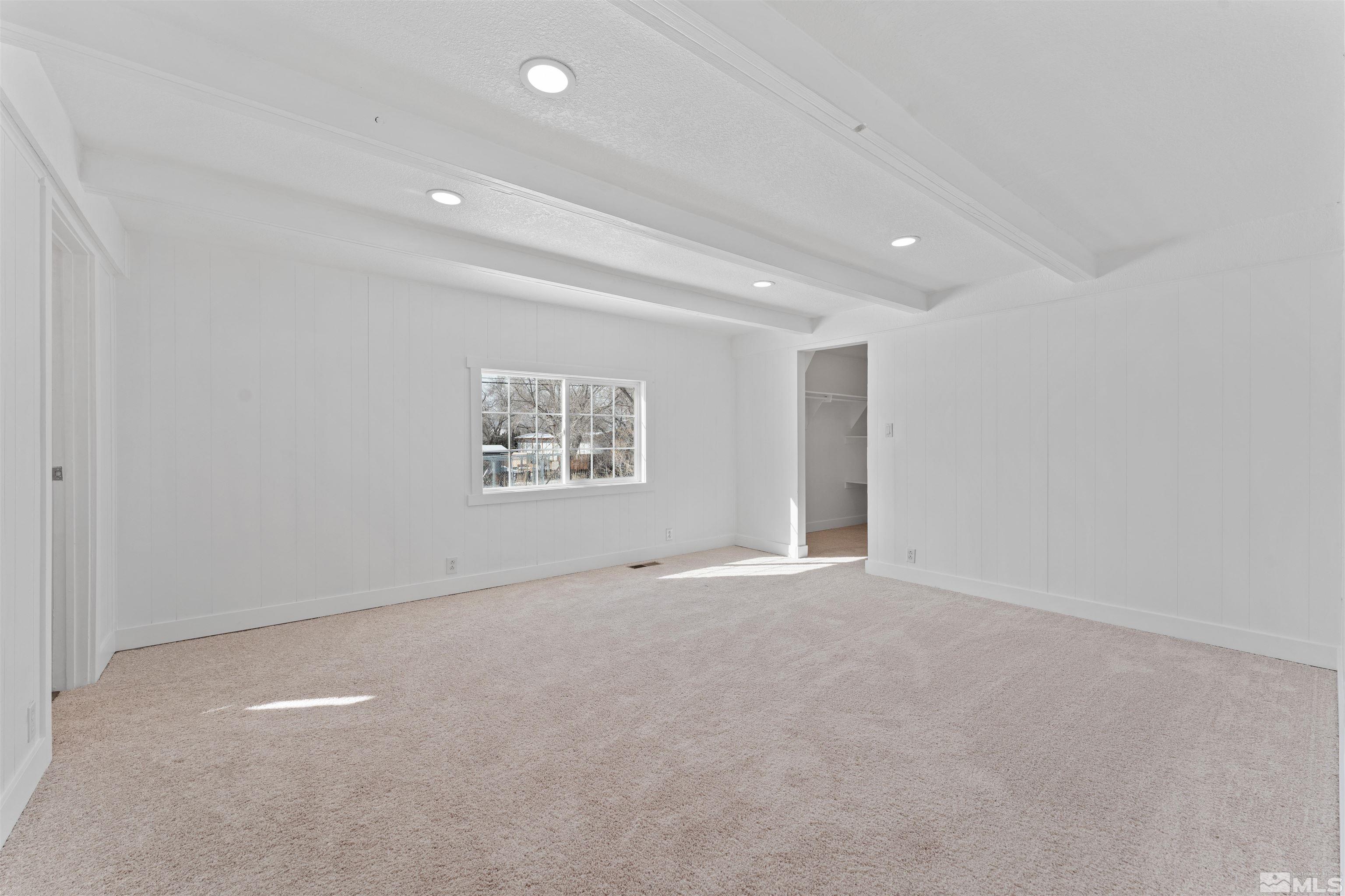 3993 Kiwi Court Reno, NV 89508 - Photo 27 of 39 an empty room with a empty space and window