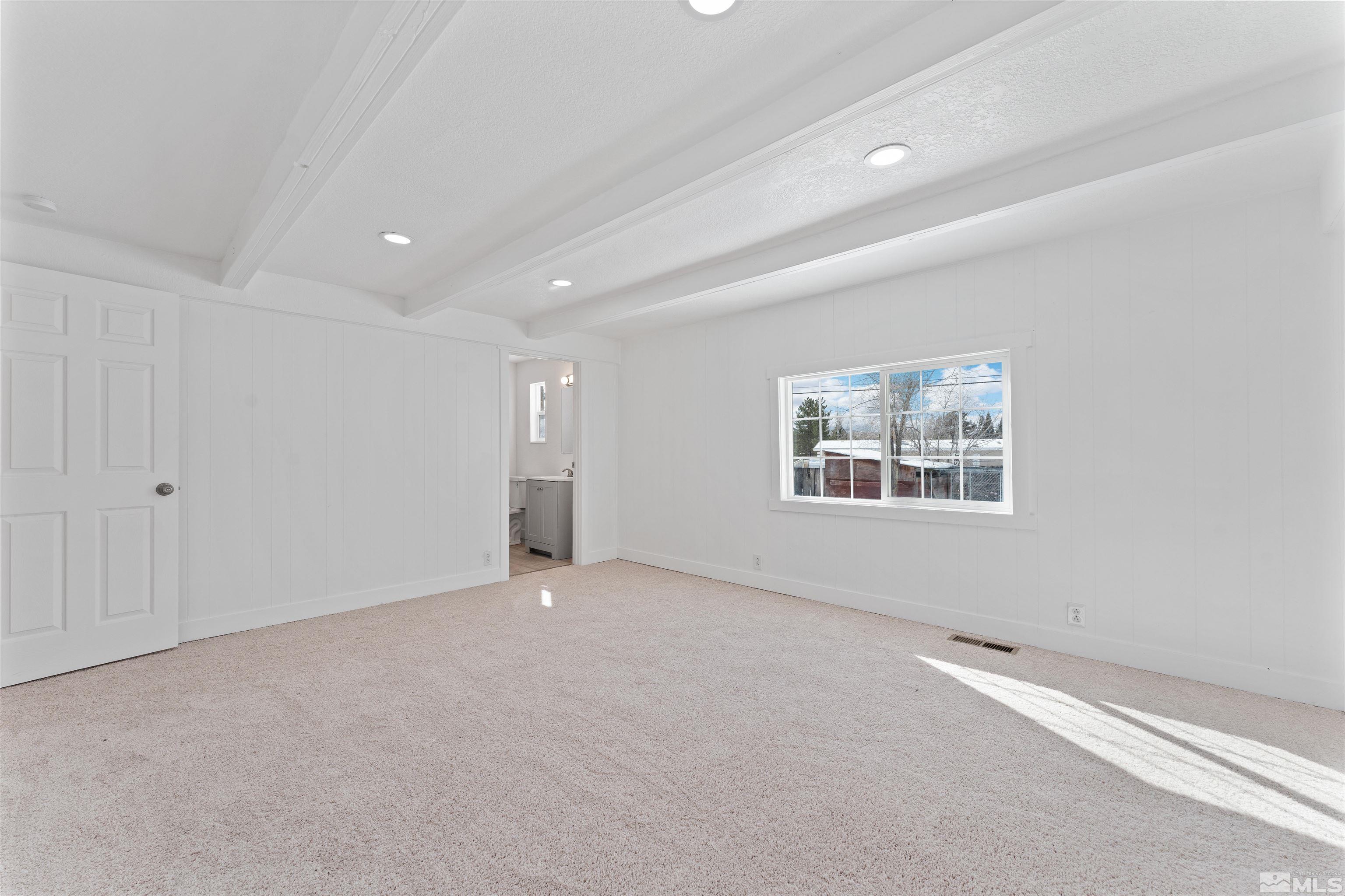 3993 Kiwi Court Reno, NV 89508 - Photo 28 of 39 a view of an empty room with a window