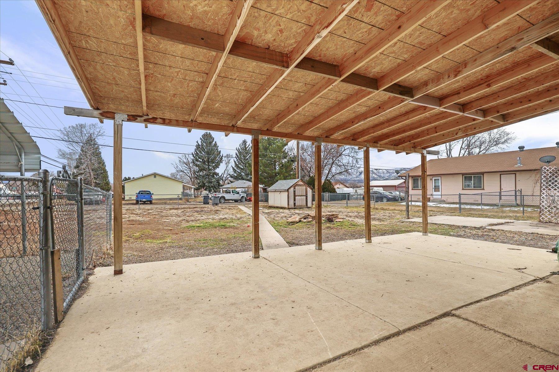 403 East 3rd Street Cortez, CO 81321 - Photo 23 of 31 a view of a backyard of a house
