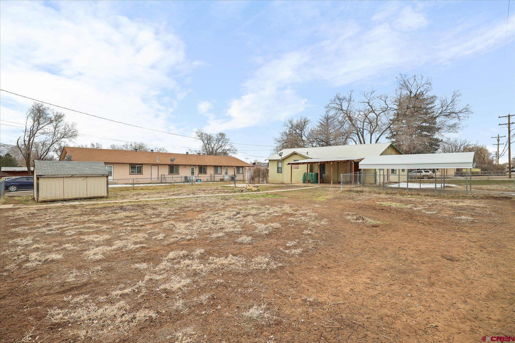 403 East 3rd Street Cortez, CO 81321 - Photo 24 of 31 a front view of a house with a yard