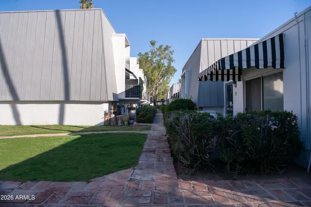 a house with garden in front of it