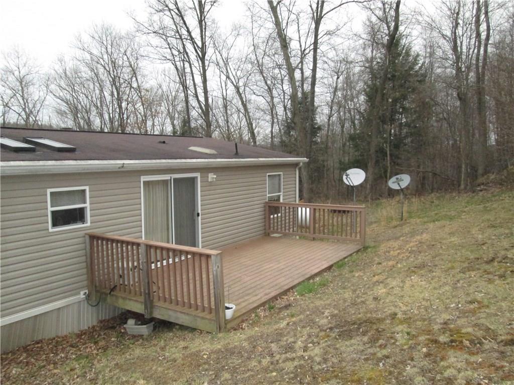 431 B School Road Clinton, PA 15026 - Photo 22 of 25 Sliding doors off the dining area leads to a large trex deck great for summer dinning or just relaxing and enjoying mother nature at her best.