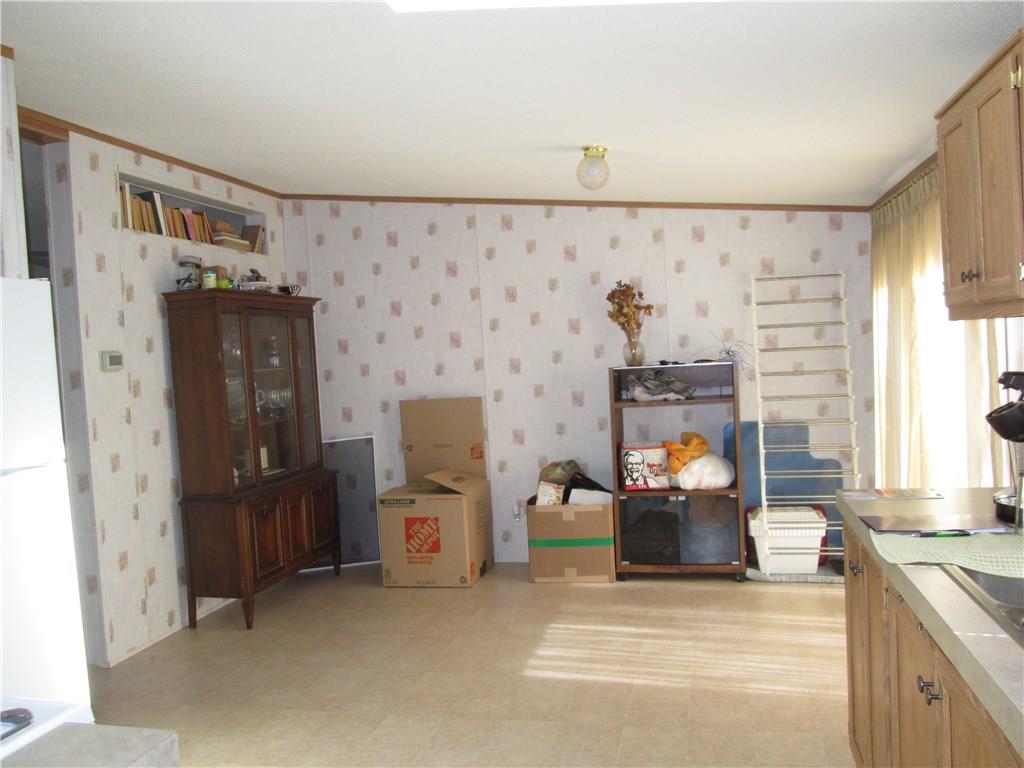 431 B School Road Clinton, PA 15026 - Photo 8 of 25 Dining area has slider leading to large deck