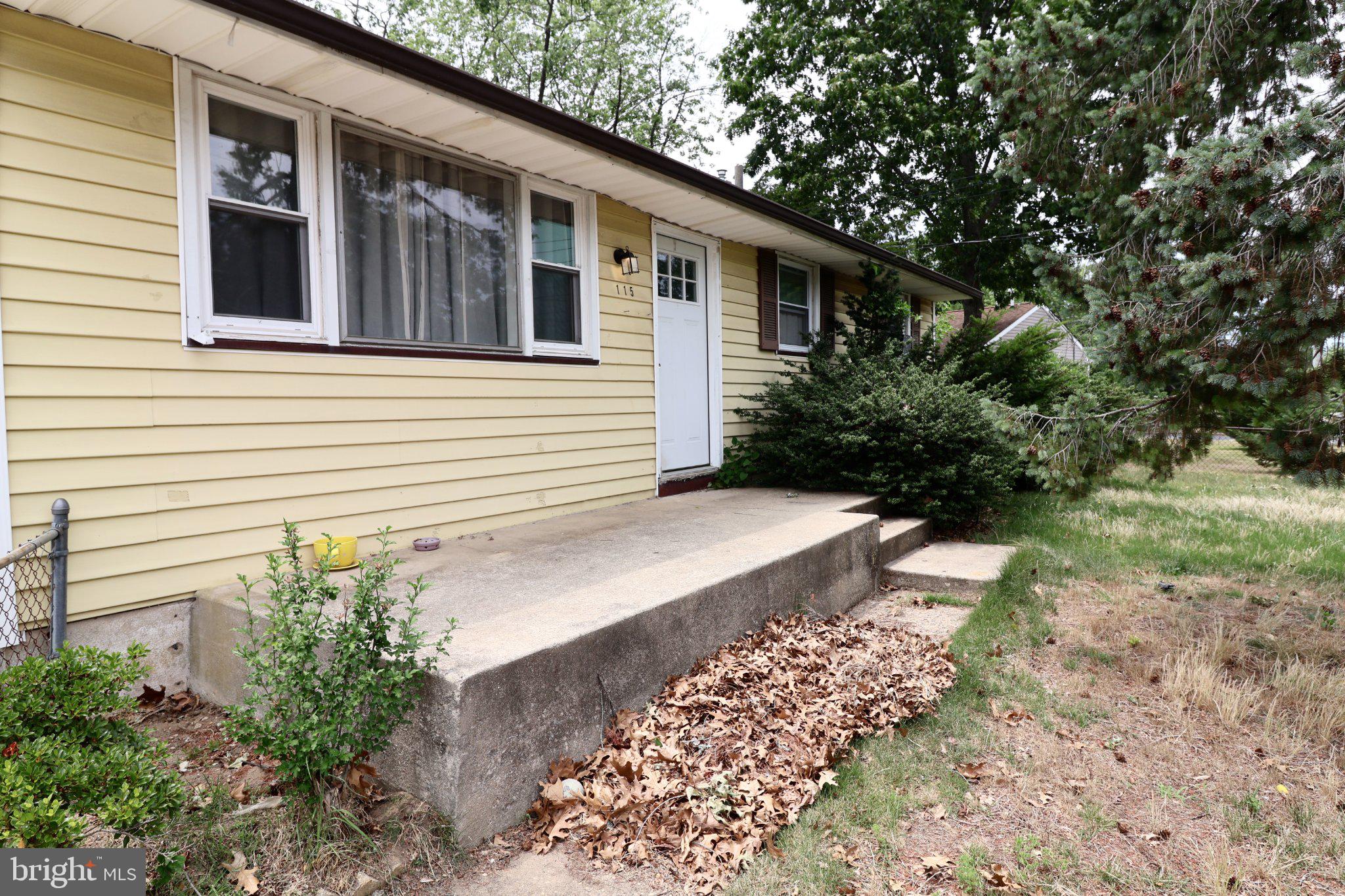 115 Country Club Road Pine Hill, NJ 08021 - Photo 3 of 14 Charming yellow home with inviting porch.