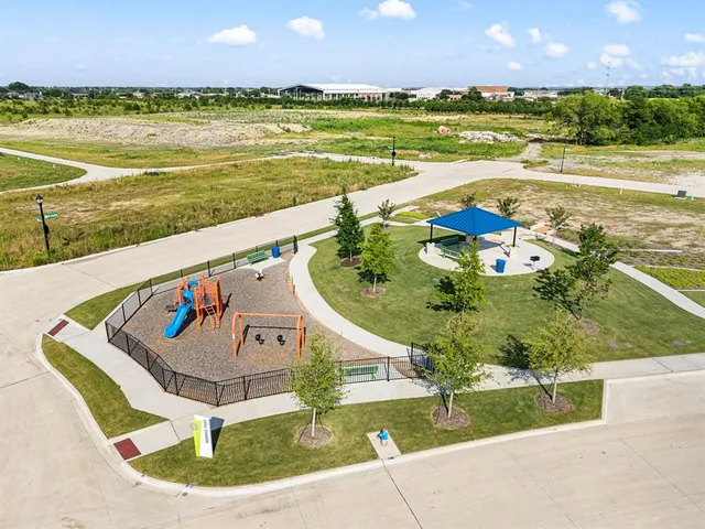 a view of a swimming pool and an outdoor space