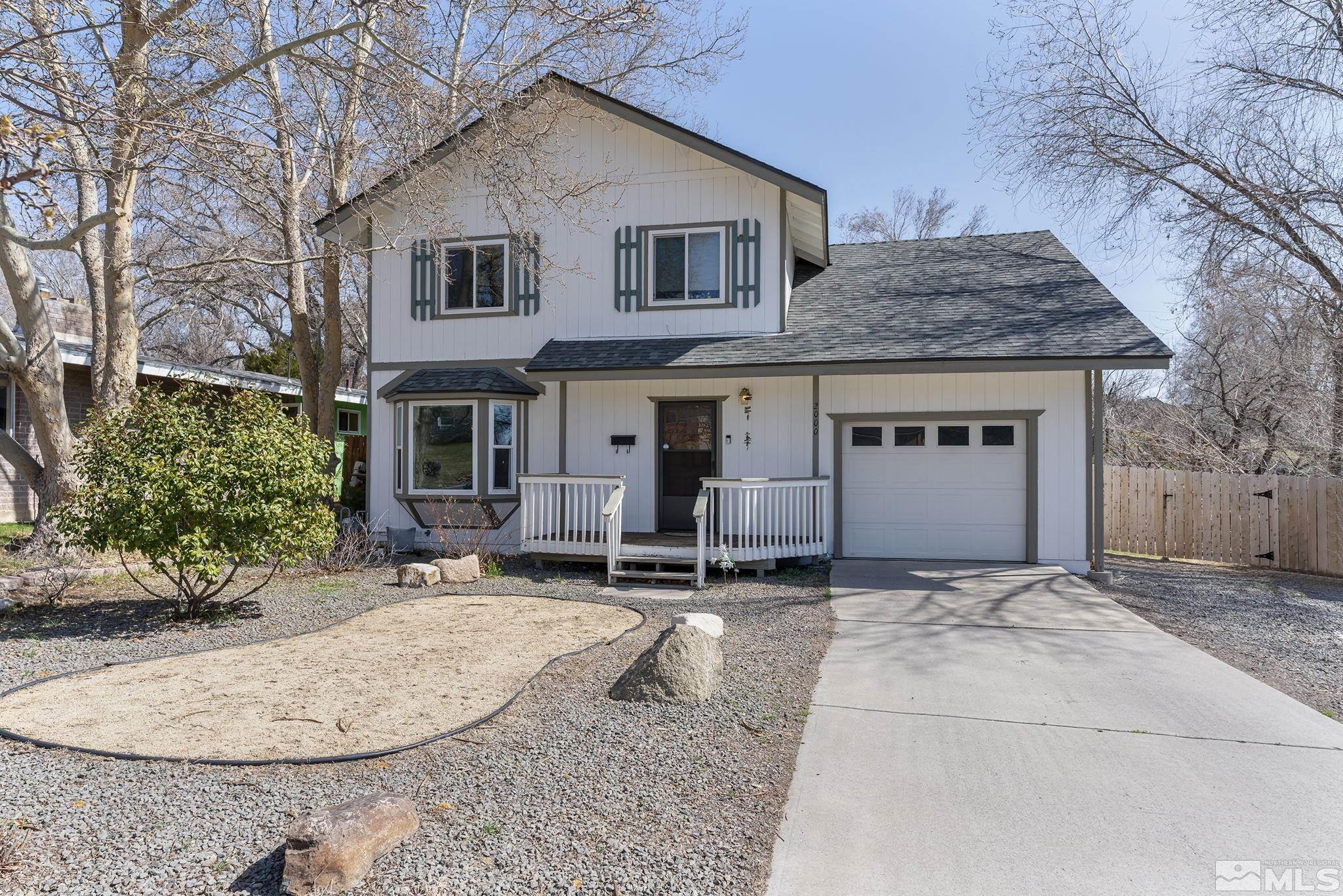 a house view with a outdoor space
