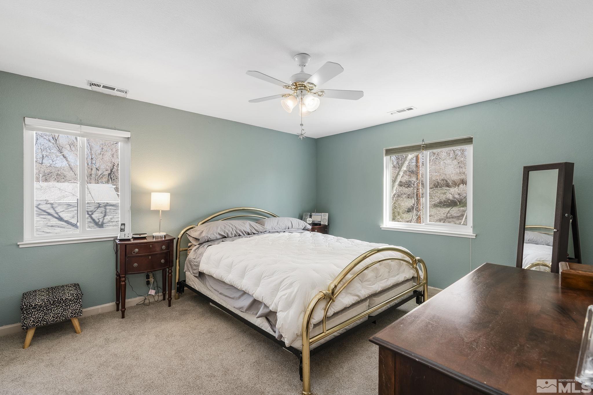 2000 Keystone Avenue Reno, NV 89503 - Photo 14 of 19 a bedroom with a bed and a table in it