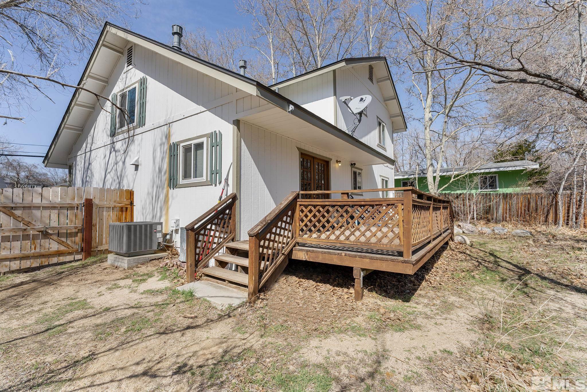 2000 Keystone Avenue Reno, NV 89503 - Photo 15 of 19 a wooden bench sitting in front of house