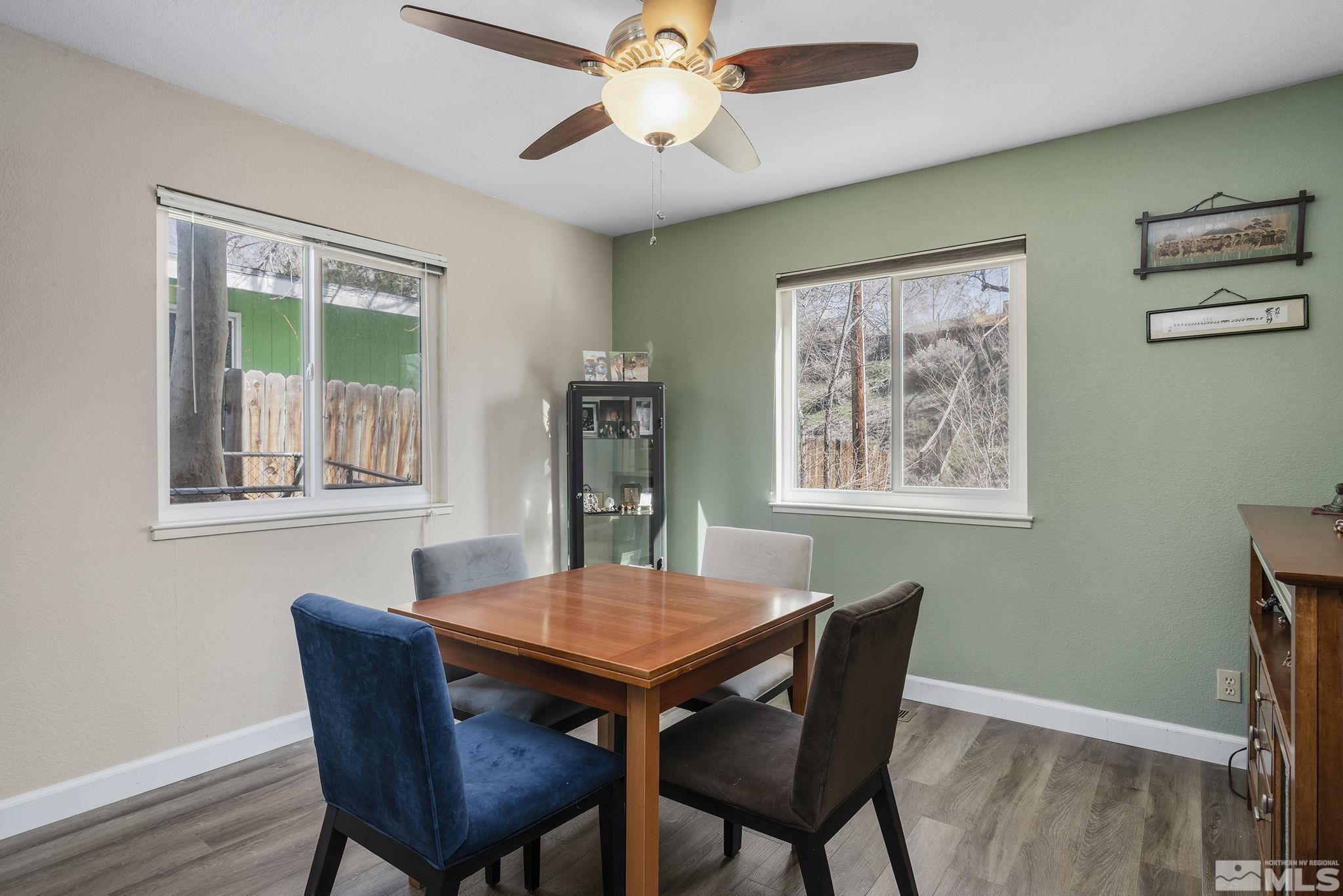 2000 Keystone Avenue Reno, NV 89503 - Photo 6 of 19 a view of a dining room with furniture window and wooden floor