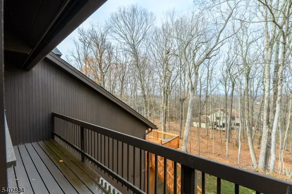 a view of balcony with furniture