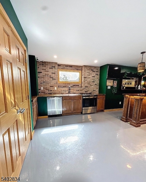 21 Starrett Court Sparta, NJ 07871 - Photo 39 of 49 a view of a kitchen with stainless steel appliances a large window and kitchen view