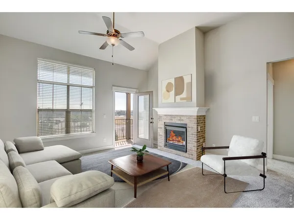 a open kitchen with cabinets and a fireplace