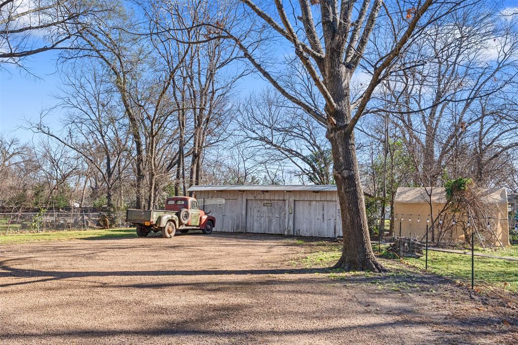 508 North Virginia Street Terrell, TX 75160 - Photo 18 of 40 a view of street with large trees