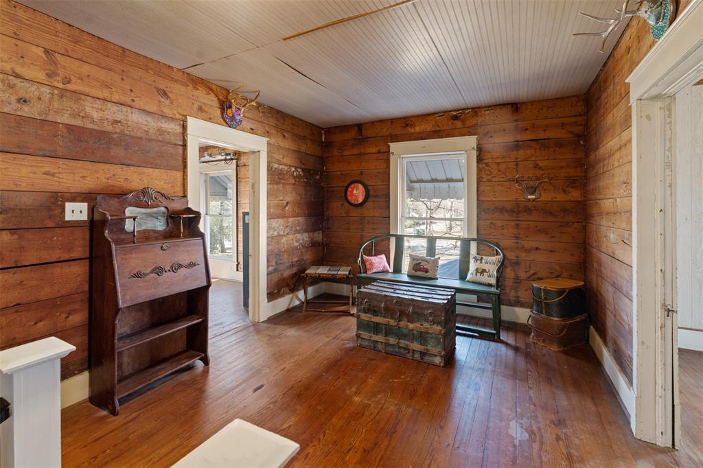 508 North Virginia Street Terrell, TX 75160 - Photo 27 of 40 a living room with furniture and a wooden floor