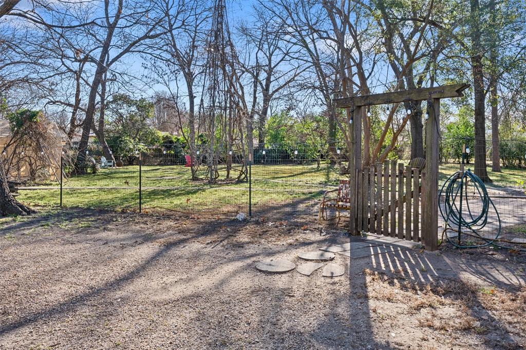 508 North Virginia Street Terrell, TX 75160 - Photo 36 of 40 a view of a park with swings and a table