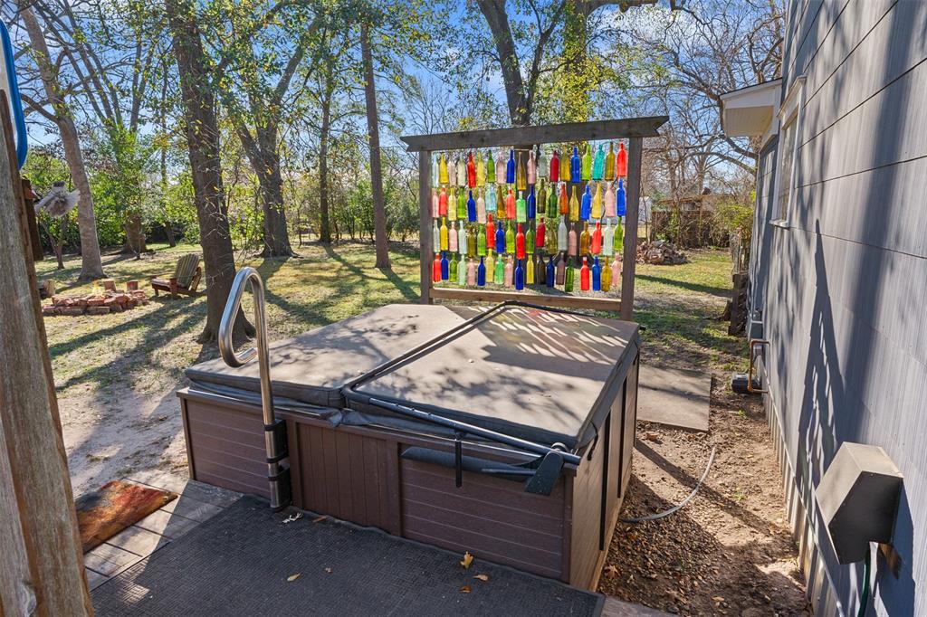 508 North Virginia Street Terrell, TX 75160 - Photo 37 of 40 a view of a backyard with a large tree
