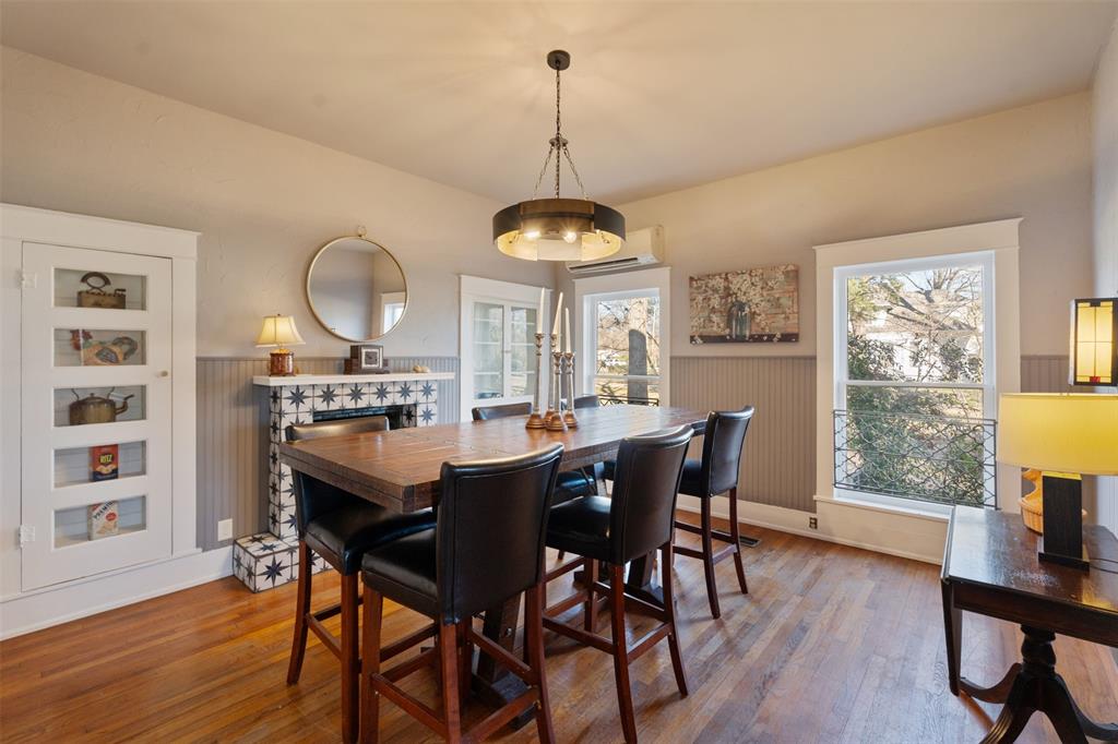 508 North Virginia Street Terrell, TX 75160 - Photo 7 of 40 a dining room with furniture a chandelier and wooden floor