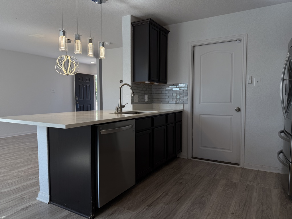709 Yearwood Lane, Unit 48E Jarrell, TX 76537 - Photo 11 of 39 a bathroom with a double vanity sink and a mirror