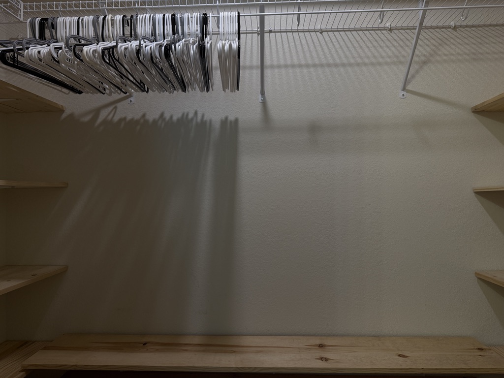 709 Yearwood Lane, Unit 48E Jarrell, TX 76537 - Photo 24 of 39 a view of walk in closet