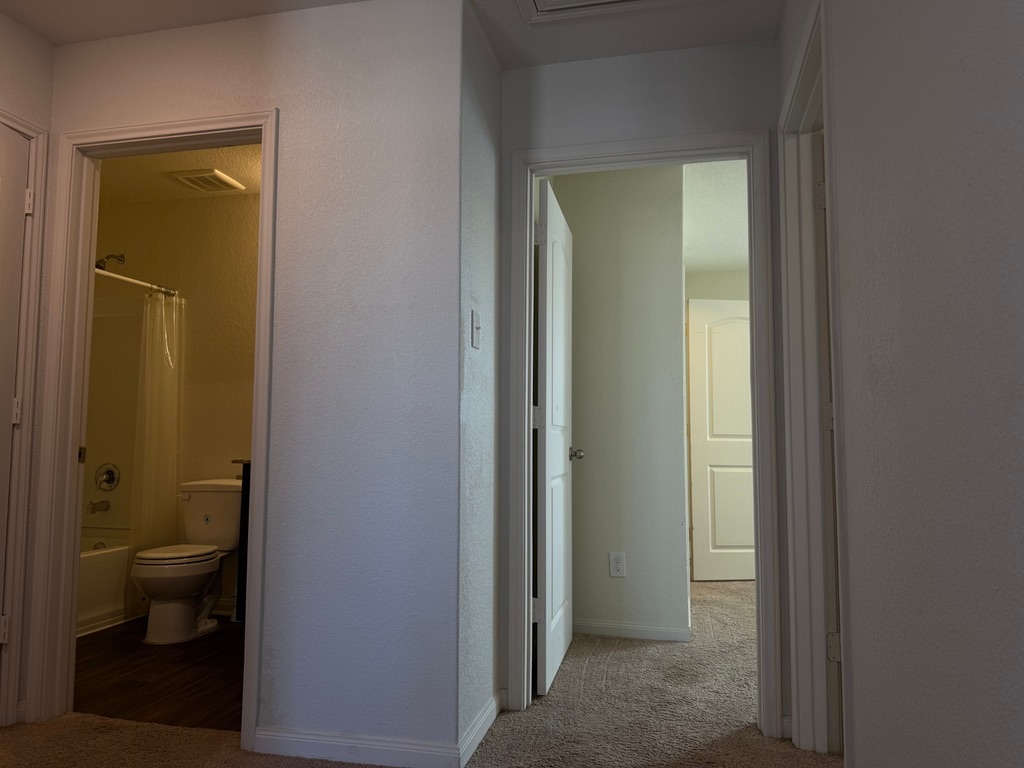 709 Yearwood Lane, Unit 48E Jarrell, TX 76537 - Photo 25 of 39 a bathroom with a toilet