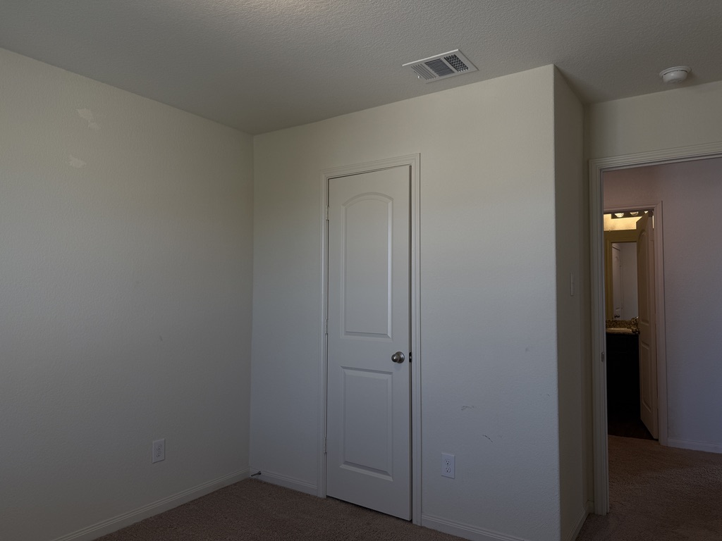 709 Yearwood Lane, Unit 48E Jarrell, TX 76537 - Photo 26 of 39 a view of closet area